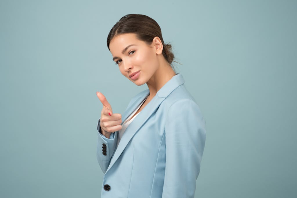 Photo by Moose Photos a young motivated woman in blue suit